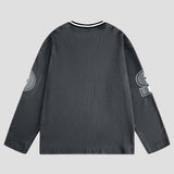 Stylish streetwear featuring personalized embroidered graffiti and loose fit.