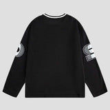 Perforated hip-hop tee with personalized embroidery for urban style.