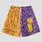 Cooling fabric shorts with embroidery pattern and color block design.