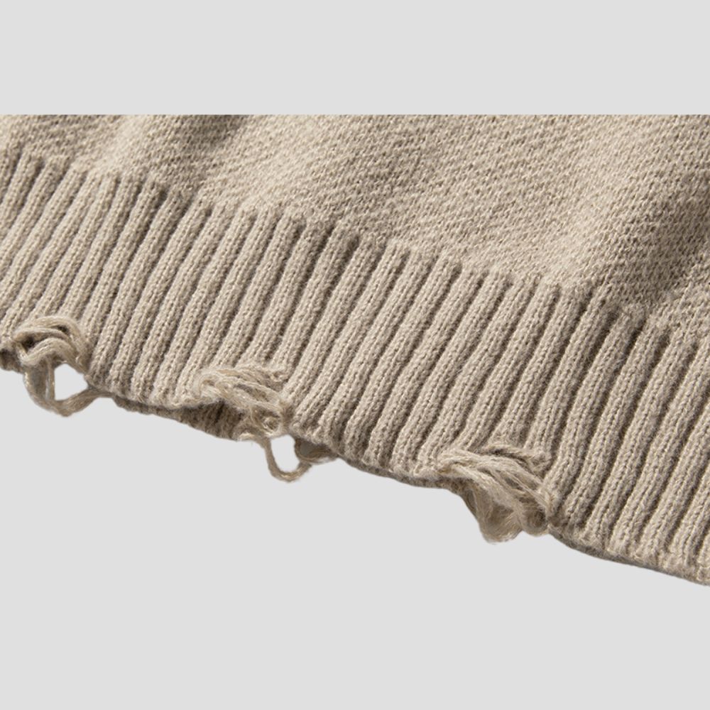 Loose fit vintage sweater with shredded detailing
