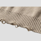 Loose fit vintage sweater with shredded detailing
