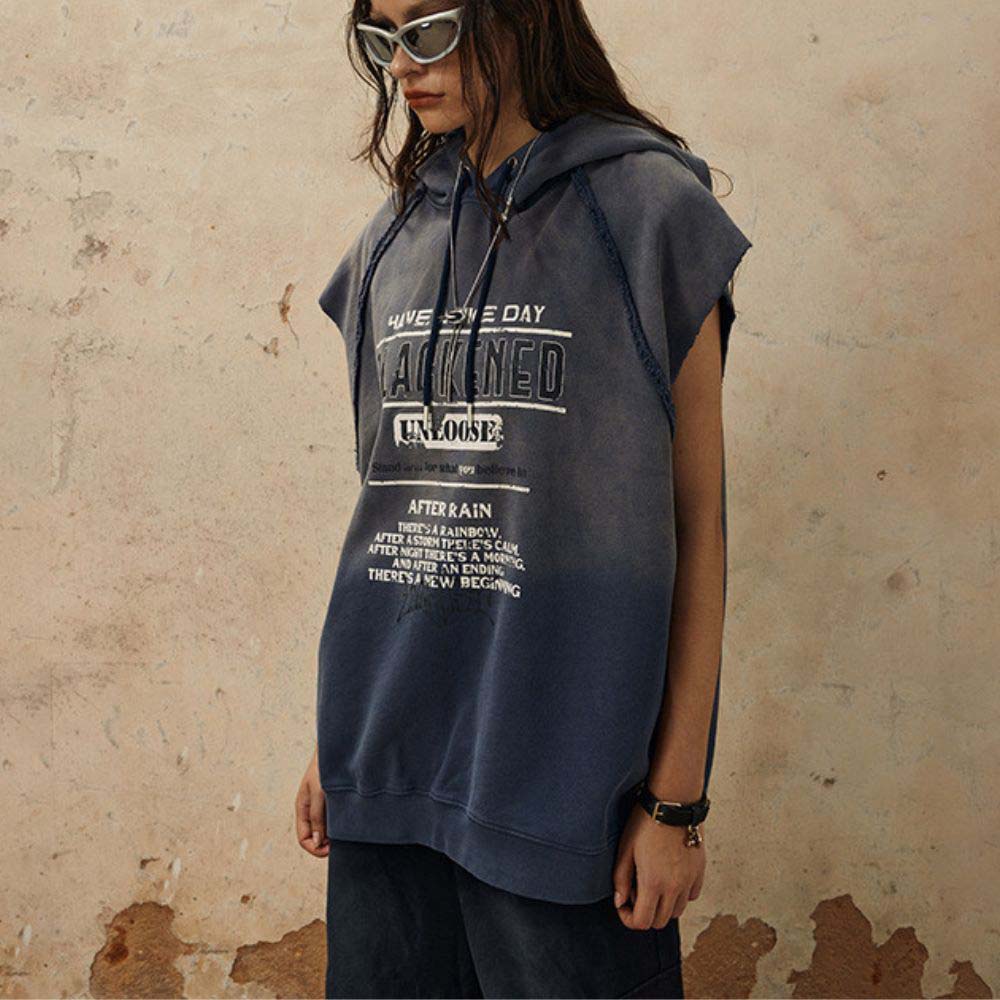 Stylish sleeveless hoodie with a soft touch and graffiti-inspired design.