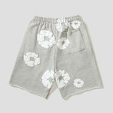 Street-style hip-hop shorts with white floral print