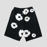 Loose-fit unisex shorts with quick-dry fabric and floral design