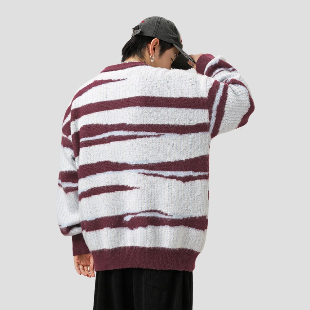 Trendy zebra striped sweater for various casual occasions.
